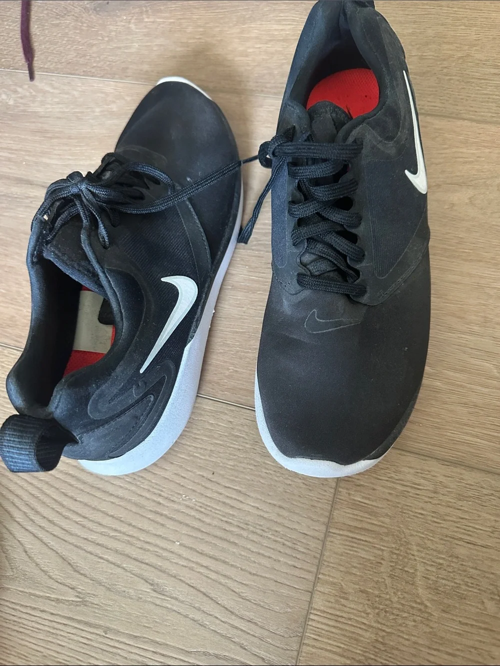 Nike Black and White Athletic Slip-On Sneakers